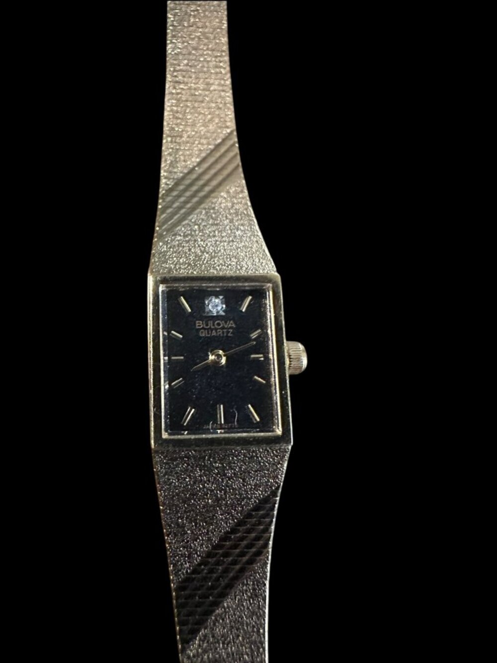 Bulova Quartz Women's Gold Tone Black Dial Diamond Tank Watch